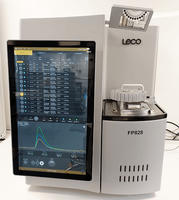 LECO FP828 Protein Analyser, used for determining nitrogen content in food and agricultural products, featuring a touchscreen interface for displaying real-time analysis data
