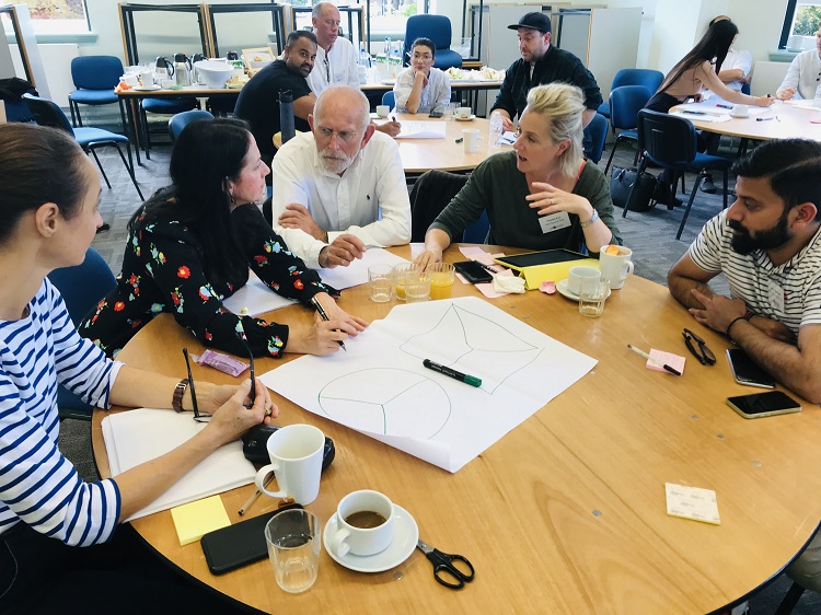 Entrepreneurs swapping ideas and business strategies